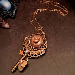 bohemian sun and moon cabochon necklace with stars and gold chain with stars and moons