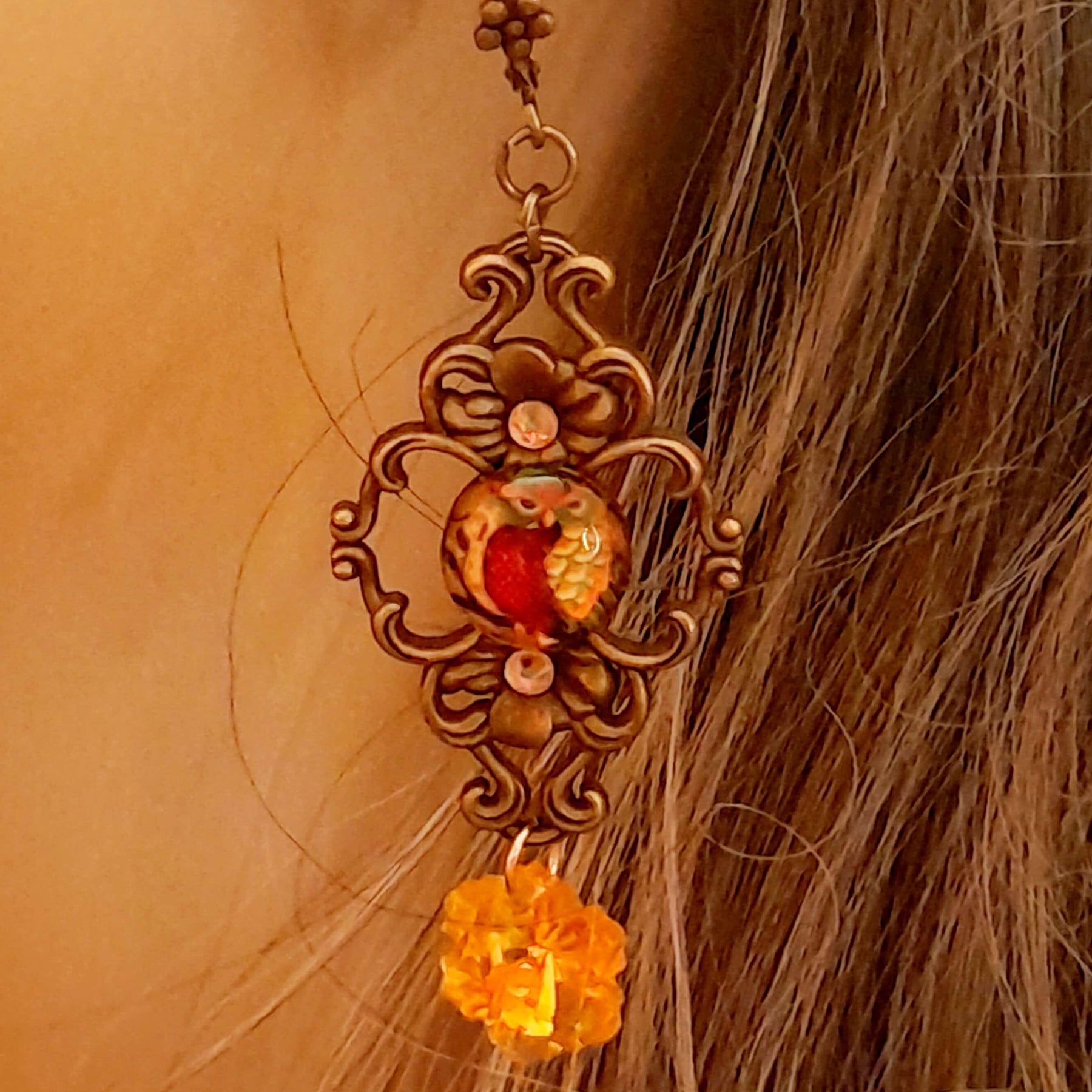 victorian vintage style dangle drop earrings with owl cabochons and yellow flower crystals