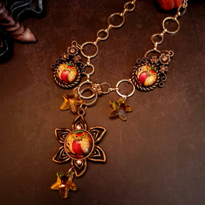 owl necklace with yellow star crystals and yellow brown tones floral settings for owl cabochons