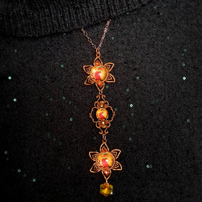 necklace with 3 owl cabochons with yellow backgrounds and Yellow Swarovski crystals