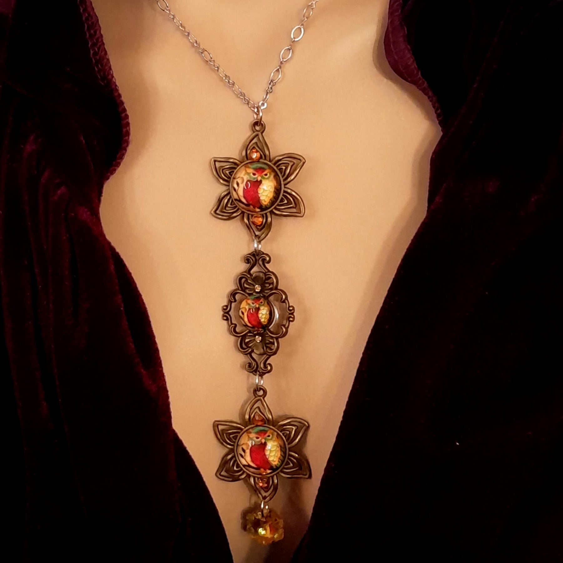 necklace with 3 owl cabochons with yellow backgrounds and Yellow Swarovski crystals