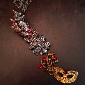 necklace with peacock mask ornate flower and swarovski crystals