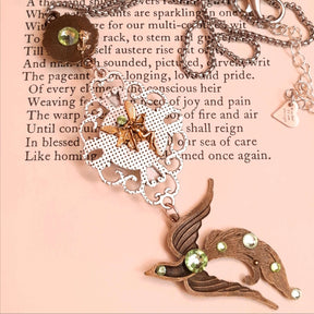 peacock cabochon peacock eye magical phoenix swarovski volcano and peridot crystals hidden fairies on the back