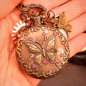 Magical handmade steampunk pocket watch necklace with lavender purple Swarovski crystals worn as wearable fantasy jewelry, Victorian vintage style