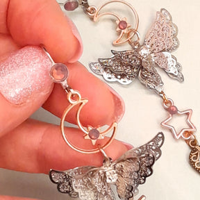 Purple crystal moon butterfly dangle earrings magical Victorian style vintage style handmade Swarovski crystals