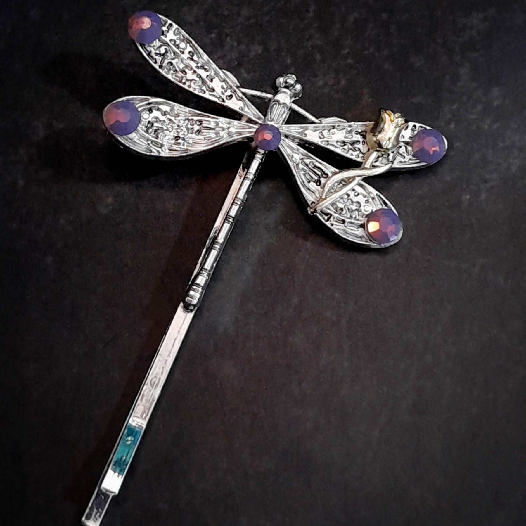 dragonfly hairclip with swarovski amethyst opal purple crystals and a small flower accent