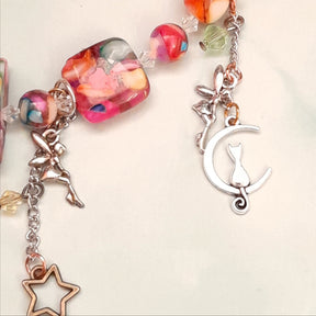 Handmade magical fantasy rainbow beaded necklace with flying fairy charms and Swarovski crystal bicones, Victorian style vintage style boho jewelry