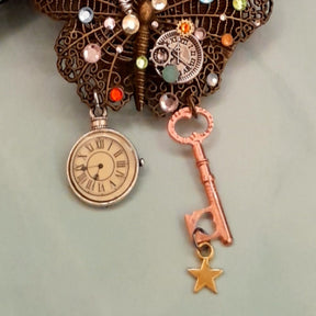 One-of-a-kind handmade magical fantasy butterfly necklace with steampunk clock face, gear charms, and rainbow Swarovski crystals, Victorian style vintage style