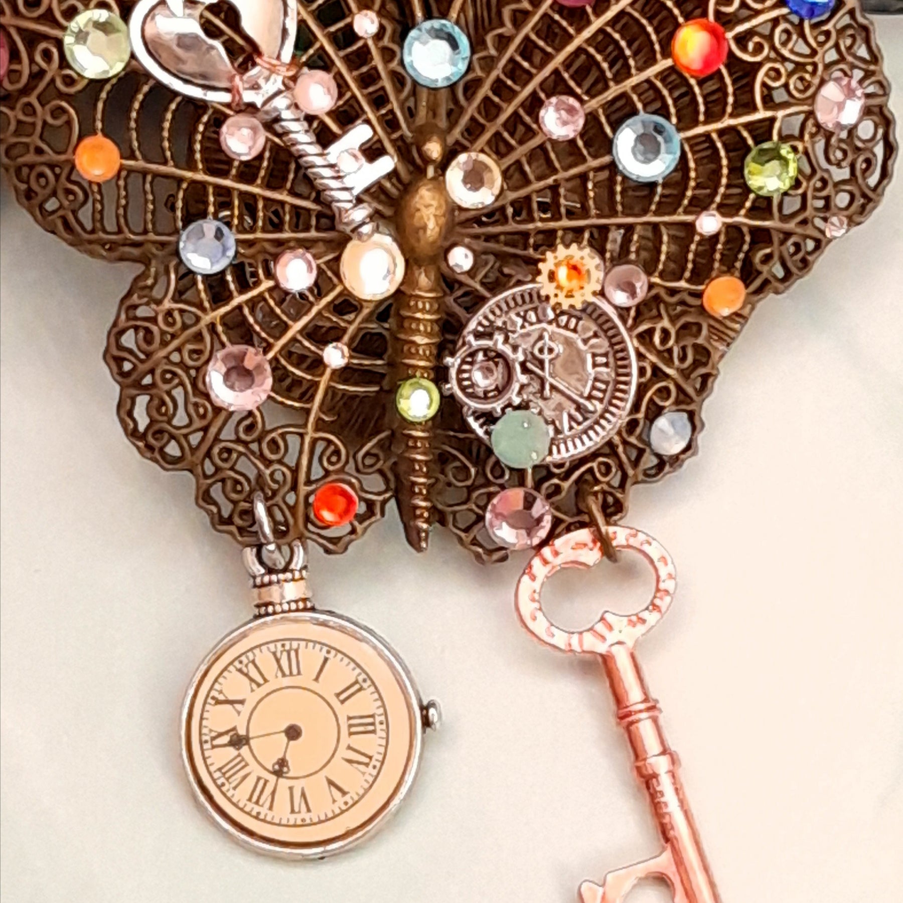 Magical fantasy butterfly necklace with rose gold skeleton key, rainbow Swarovski crystals and steampunk charms, handmade Victorian style vintage style