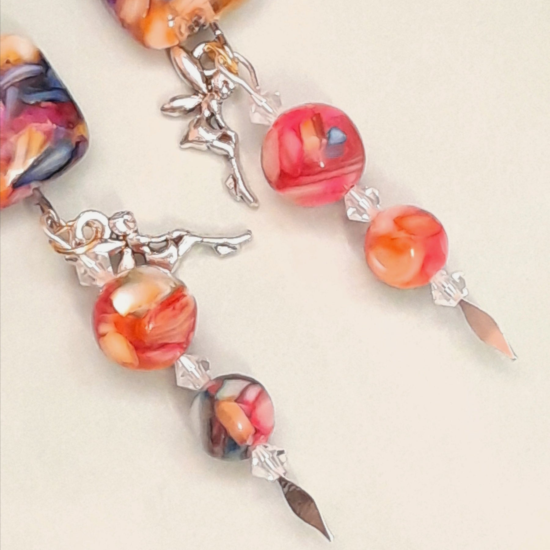 Rainbow bead dangle earrings with silver fairy charm and Swarovski crystals Victorian style vintage style