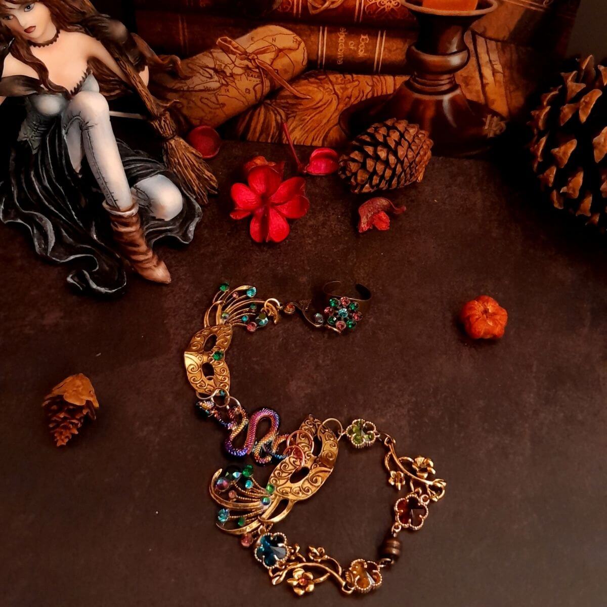 slave bracelet hand chain with adjustable flower ring and masks. colcorful flowers and vines a serpent snake and swarovski crystals