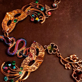 slave bracelet hand chain with adjustable flower ring and masks. colcorful flowers and vines a serpent snake and swarovski crystals