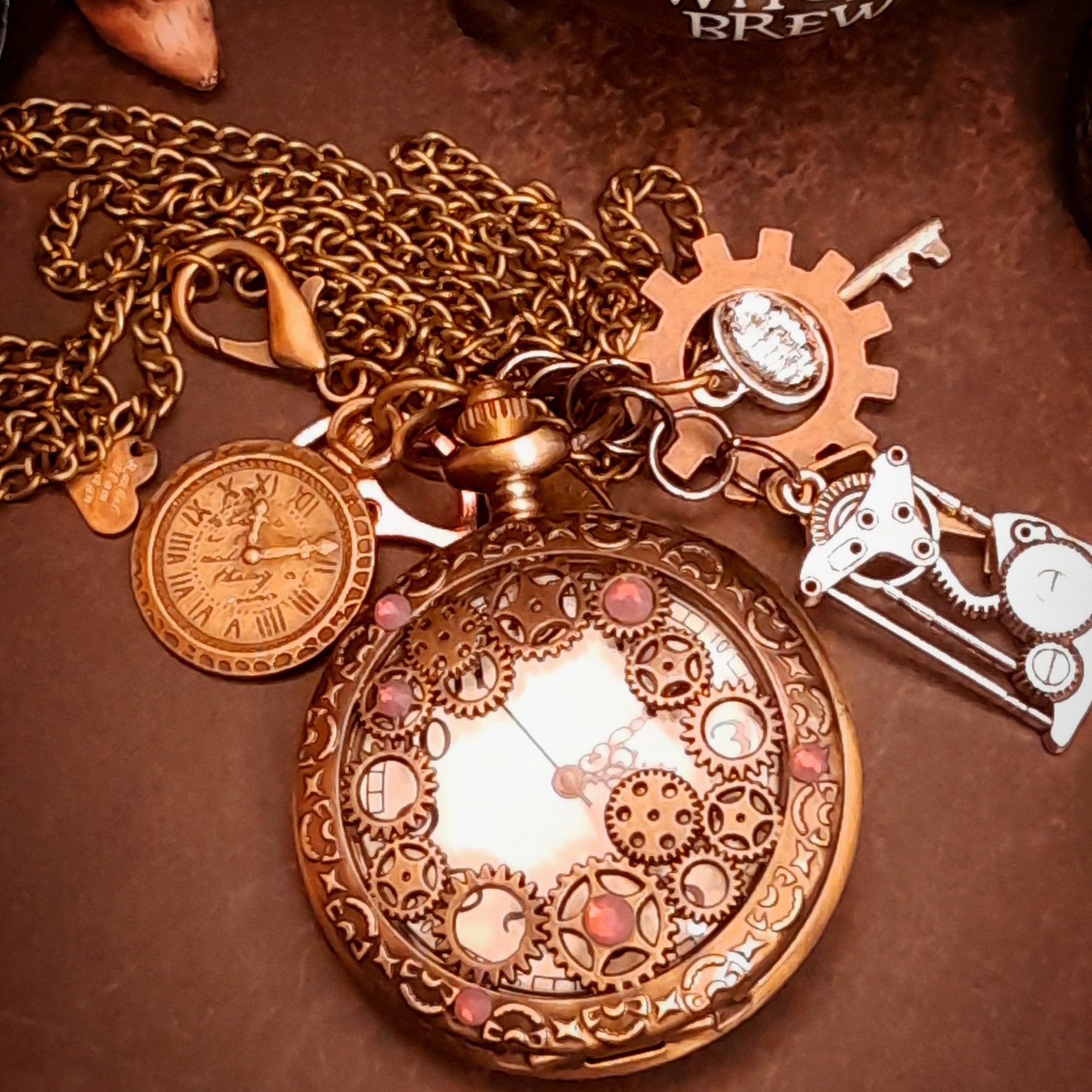 Magical steampunk pocket watch necklace with frosted lavender Swarovski crystals and vintage gear details