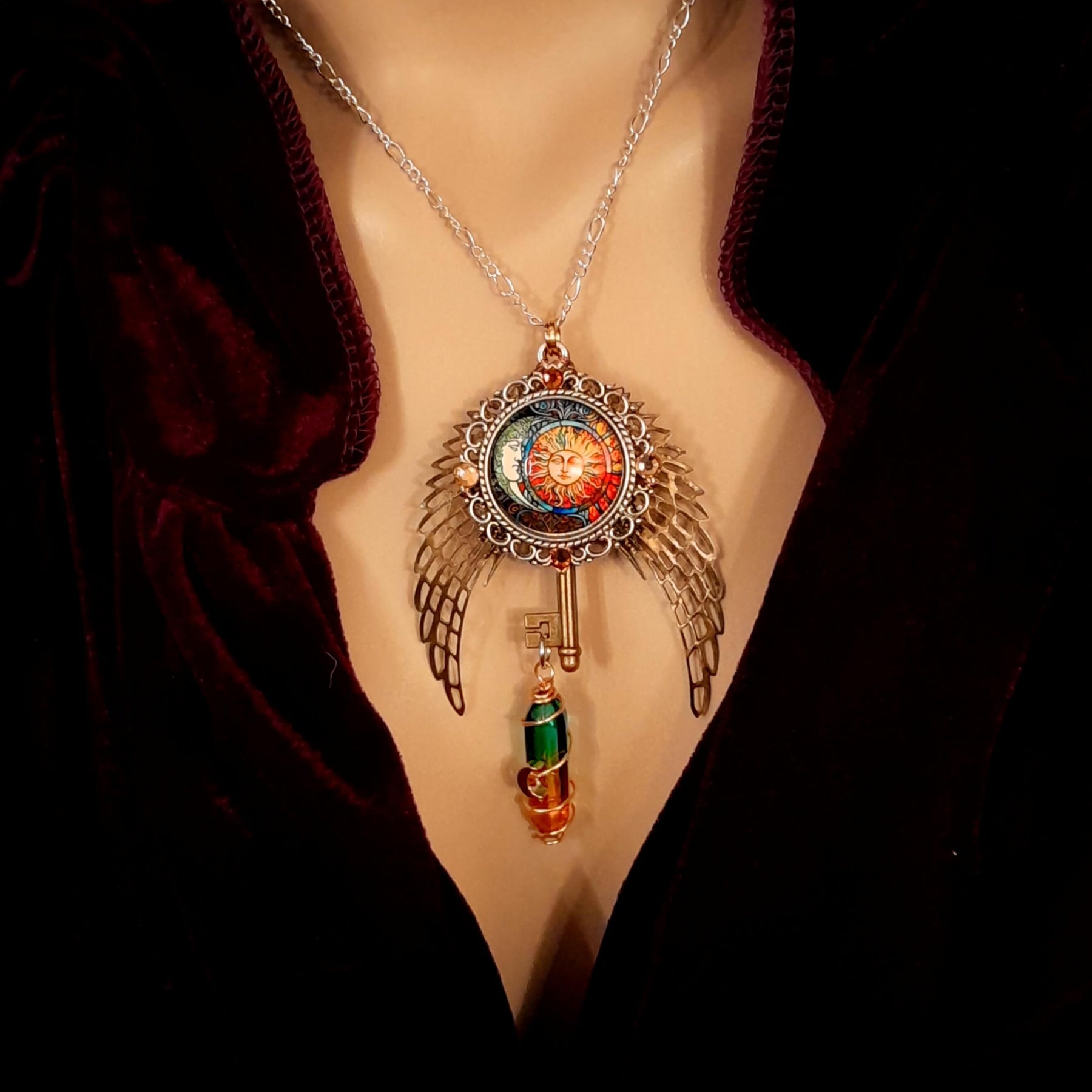 boho hippie sun and moon cabochon necklace glass icicle in pink yellow and green. angel wings swarovski crystals