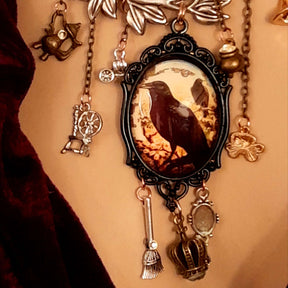 fairytale crow necklace witch hat spinning wheel cauldron mirror broom pumpkin carraige magic lamp
