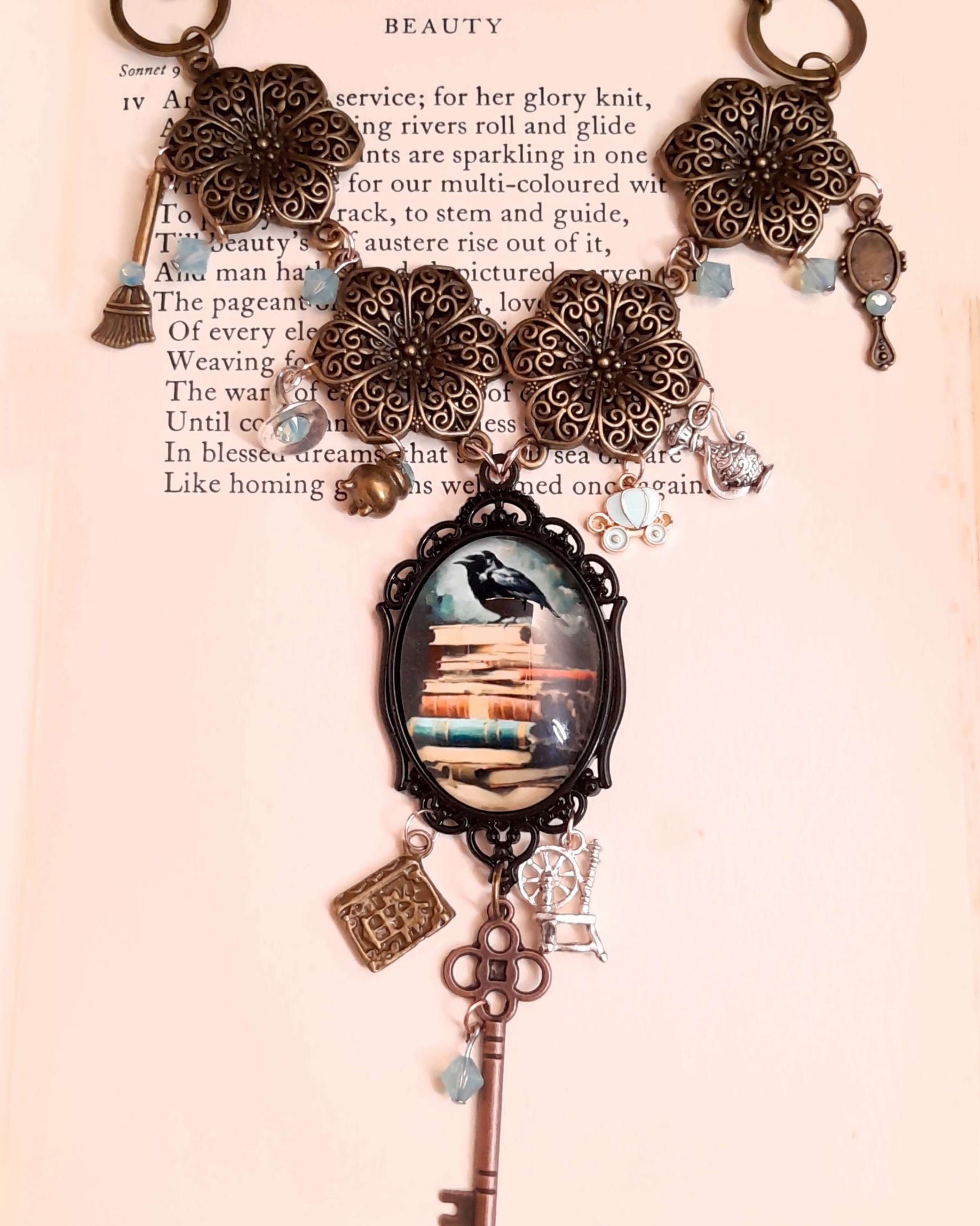 crow necklace fairytale  motifs witch hat room cauldron spinning wheel key
