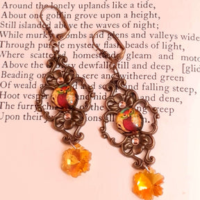 victorian vintage style dangle drop earrings with owl cabochons and yellow flower crystals