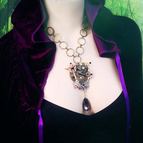hummingbird steampunk necklace black crystals on mannequin