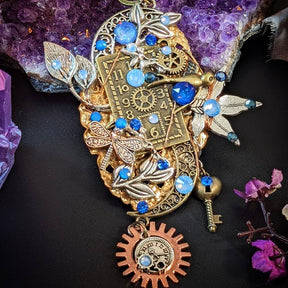 blue steampunk nature statement necklace charms closeup
